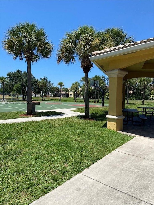 view of home's community with a lawn