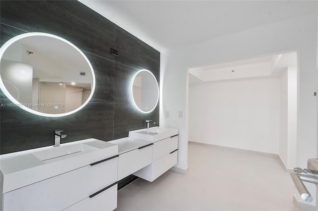 bathroom featuring vanity, tile walls, and concrete floors