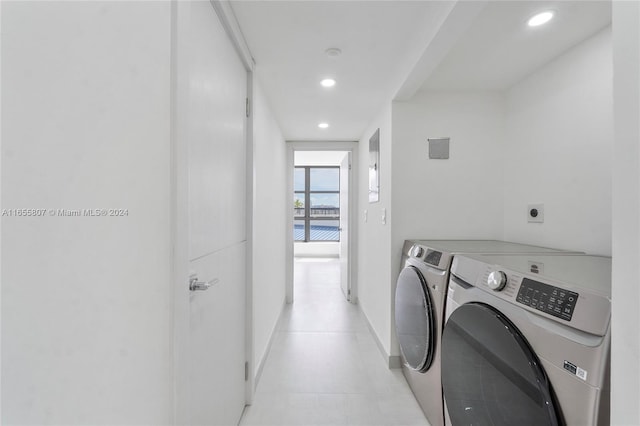 laundry area with independent washer and dryer