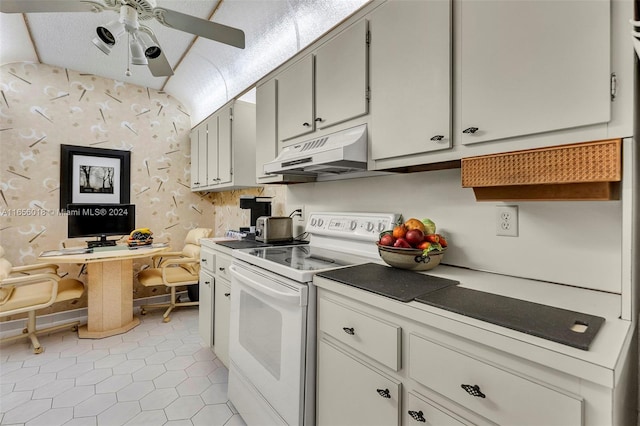 kitchen with ceiling fan, light tile patterned flooring, and white range with electric cooktop