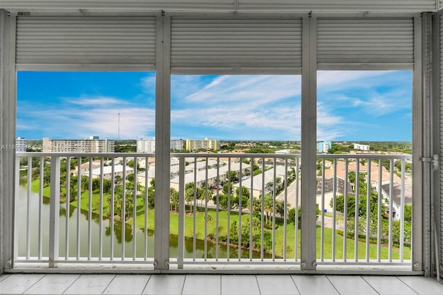 balcony featuring a water view