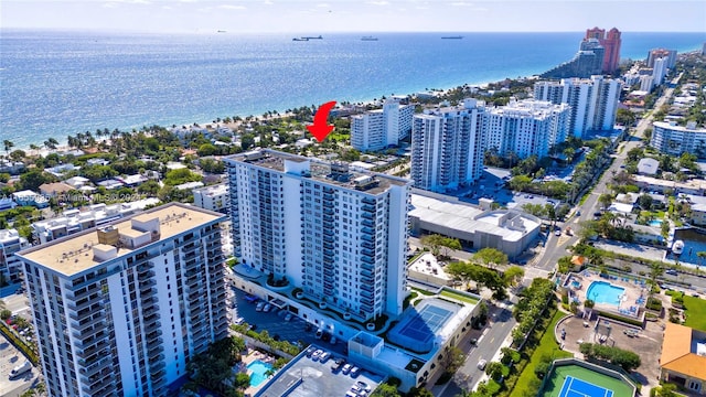 birds eye view of property featuring a water view