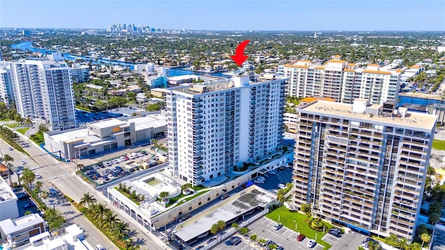 birds eye view of property with a view of city