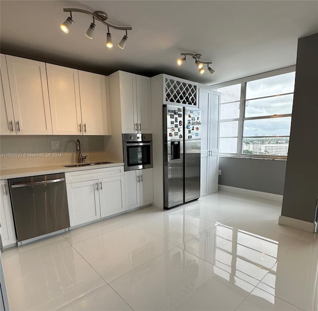 tiled living room with floor to ceiling windows