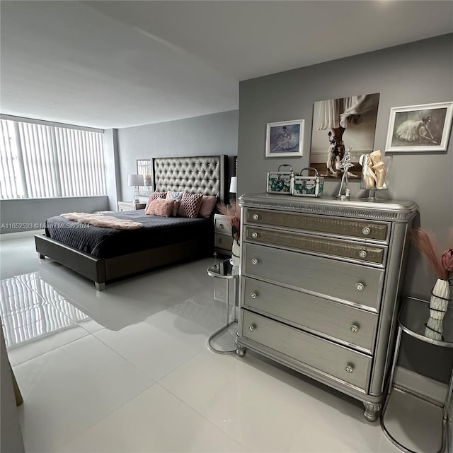 bedroom featuring tile patterned flooring