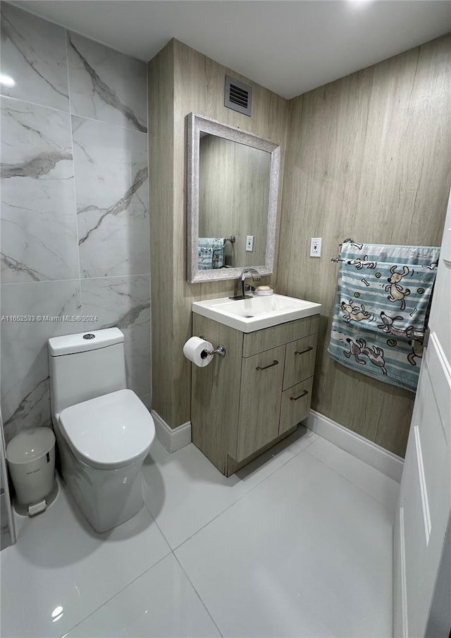 bathroom featuring visible vents, vanity, and toilet
