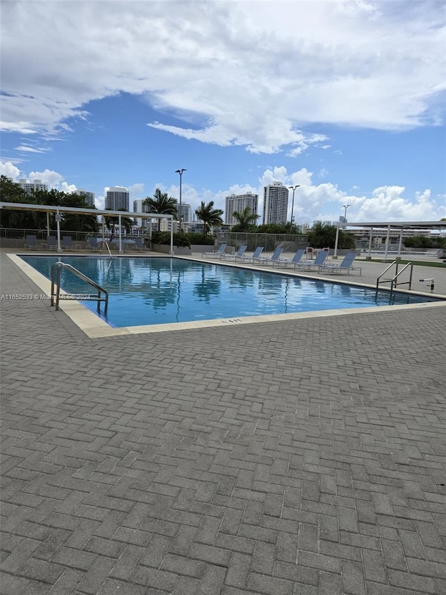community pool with a patio