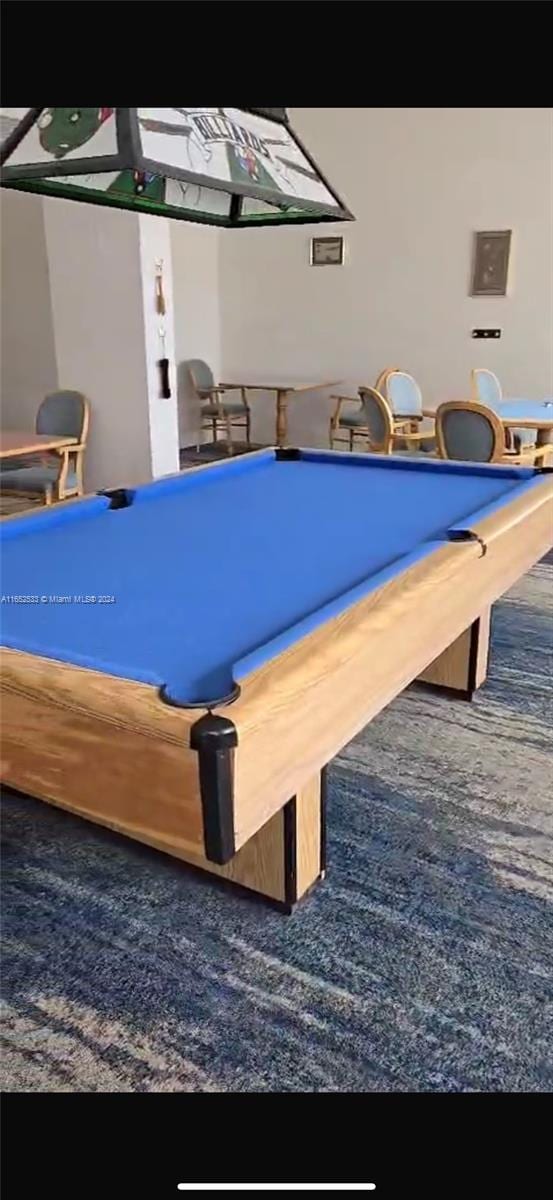 rec room featuring pool table and carpet