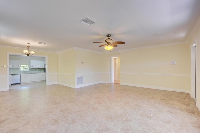 empty room with ceiling fan with notable chandelier and ornamental molding