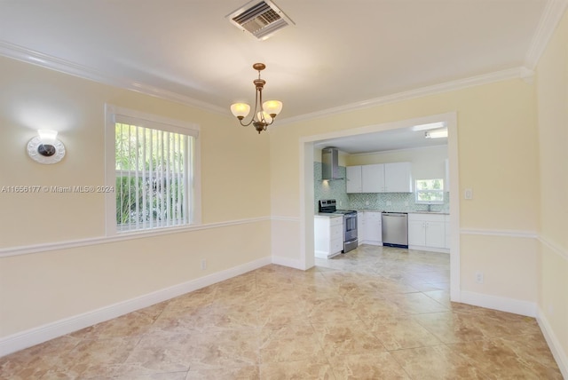 unfurnished dining area featuring a chandelier, light tile patterned floors, sink, and ornamental molding