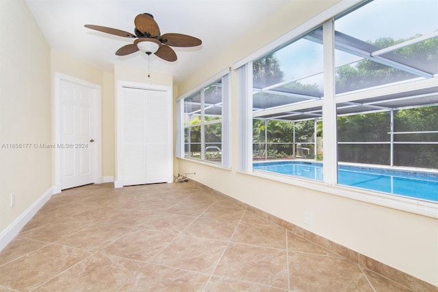 interior space featuring a wealth of natural light and ceiling fan