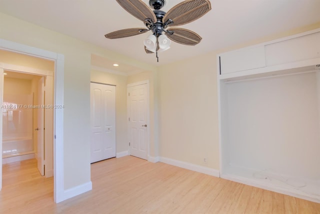 unfurnished bedroom featuring a closet, ceiling fan, and light hardwood / wood-style flooring