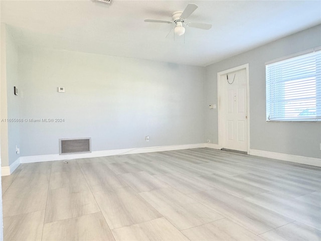 interior space featuring light hardwood / wood-style flooring and ceiling fan