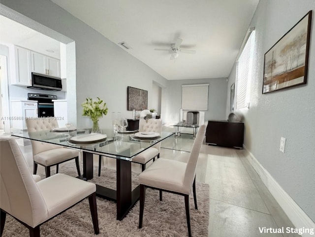 dining area featuring ceiling fan