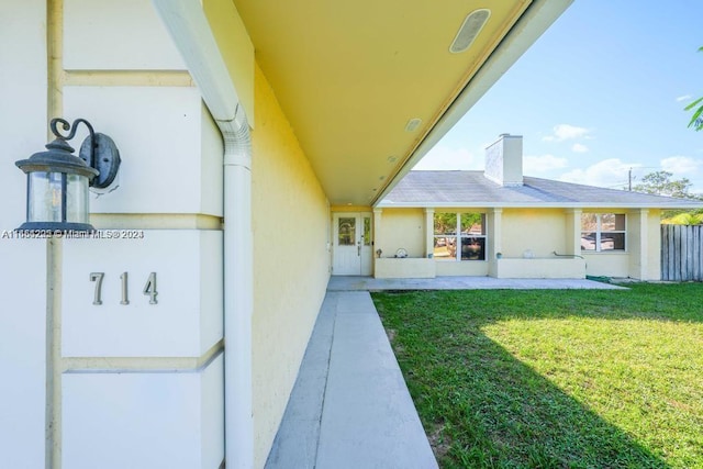 exterior space featuring a yard