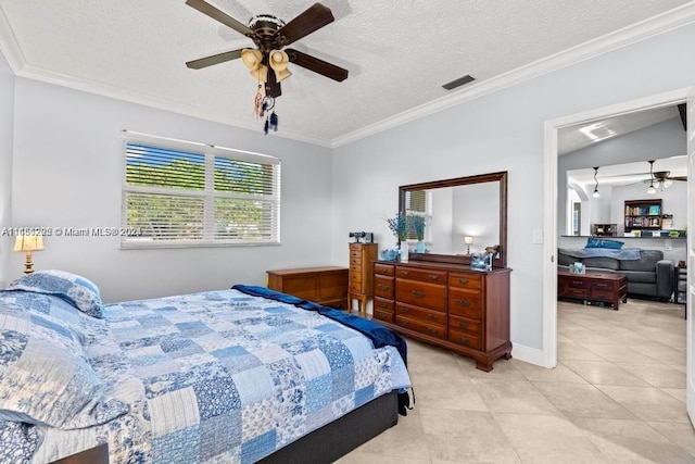 tiled bedroom featuring ceiling fan, a textured ceiling, and crown molding