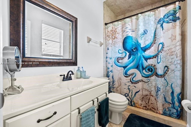 bathroom with walk in shower, vanity, toilet, and tile patterned floors