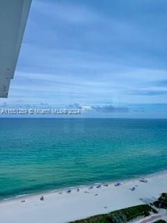 view of water feature with a beach view