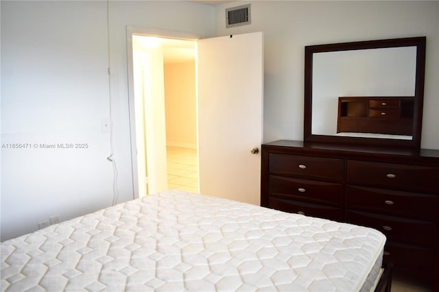 bedroom with visible vents