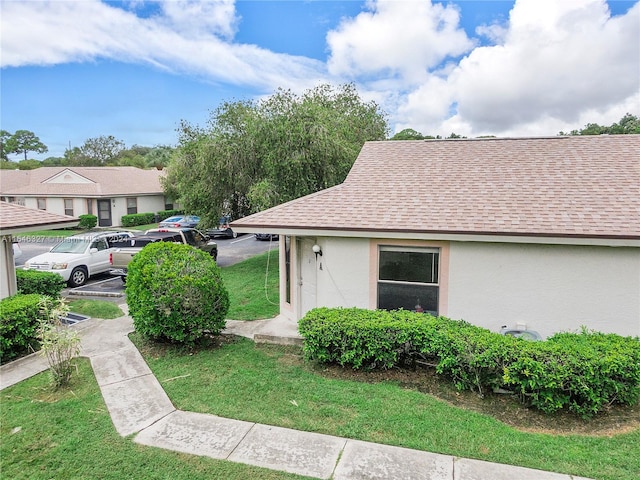 exterior space with a front lawn