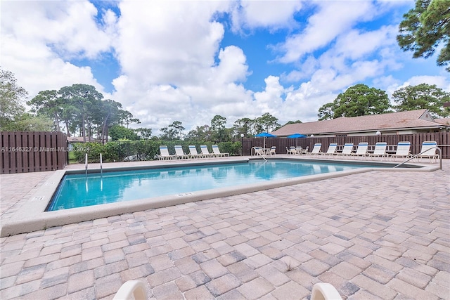 view of pool with a patio area