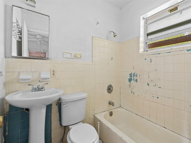 bathroom with tile walls, toilet, decorative backsplash, and  shower combination