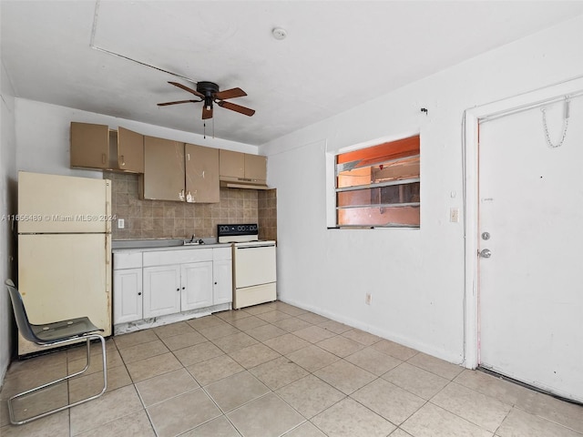 kitchen with white appliances, light tile patterned floors, sink, decorative backsplash, and ceiling fan