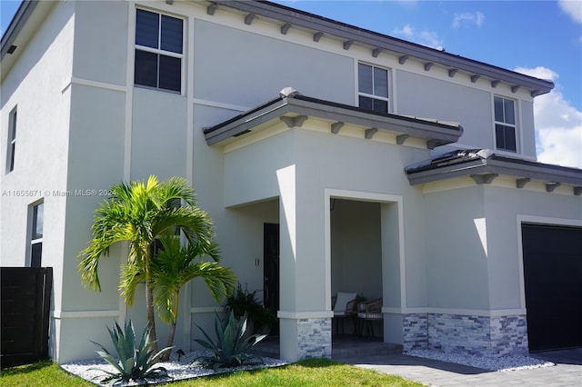 exterior space with a garage