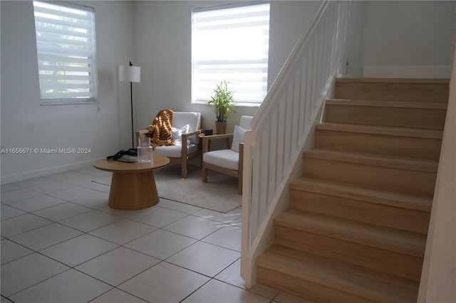 stairs with tile patterned flooring