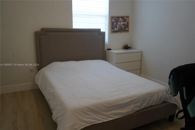 bedroom featuring light hardwood / wood-style flooring