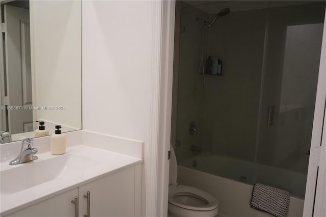 full bathroom with vanity, tub / shower combination, and toilet