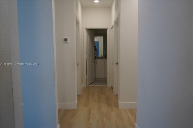 hallway featuring light hardwood / wood-style flooring