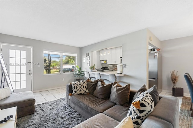 living room with light tile patterned floors