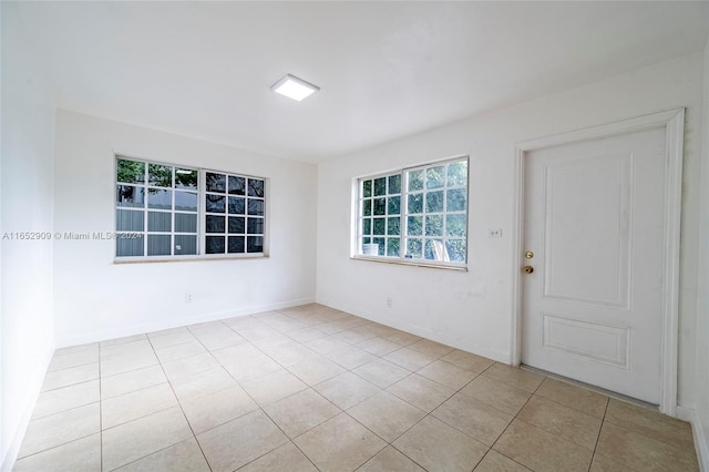 view of tiled spare room