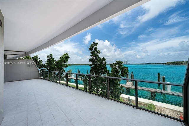 balcony featuring a water view