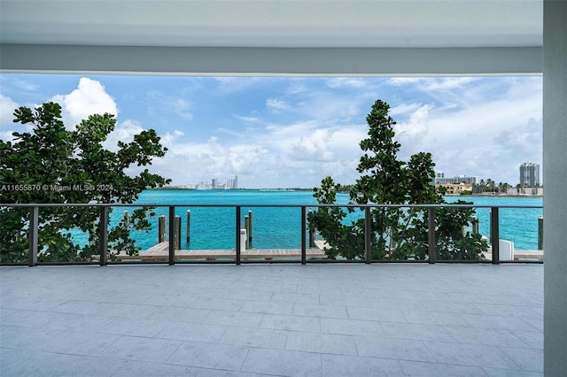 1135 103rd St Unit 202, Bay Harbor Islands, FL 33154 - view of patio / terrace featuring a view of skyline and a water view