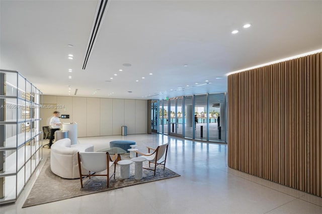 1135 103rd St Unit 202, Bay Harbor Islands, FL 33154 - lobby with a wall of windows and recessed lighting