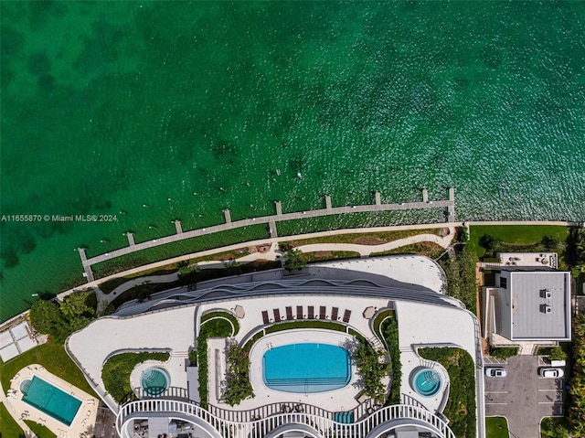 drone / aerial view with a water view