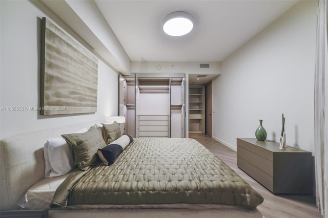 bedroom featuring light hardwood / wood-style floors