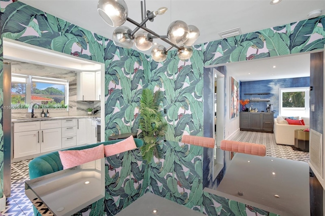 bathroom with vanity and a wealth of natural light