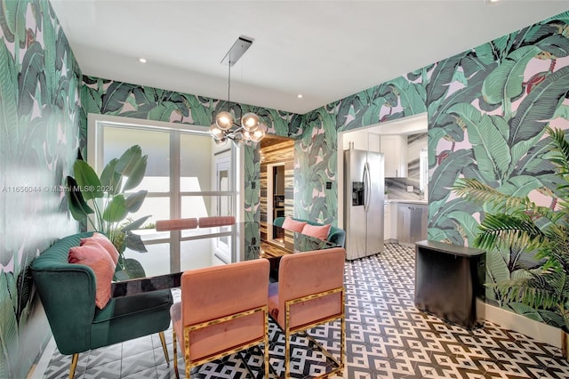 dining room with a chandelier