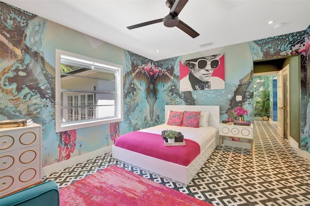 bedroom featuring ceiling fan and carpet floors