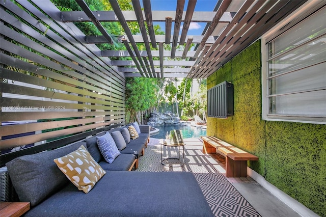 view of patio / terrace featuring outdoor lounge area and a pergola