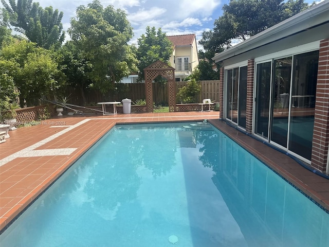 view of pool with a deck