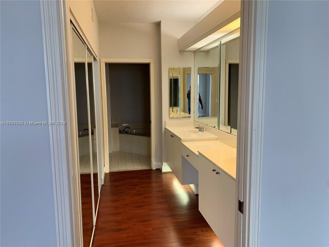 washroom with cabinets, light tile patterned floors, and independent washer and dryer