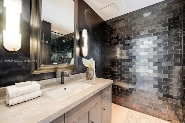 bathroom with tile patterned floors and vanity