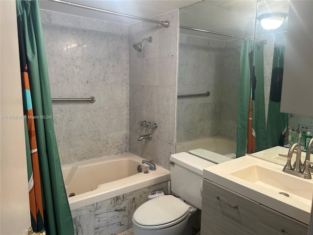 full bathroom featuring shower / bath combo, vanity, and toilet