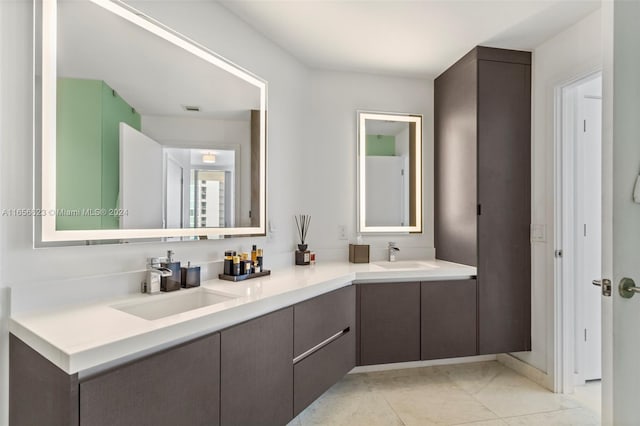 bathroom with vanity and tile patterned floors