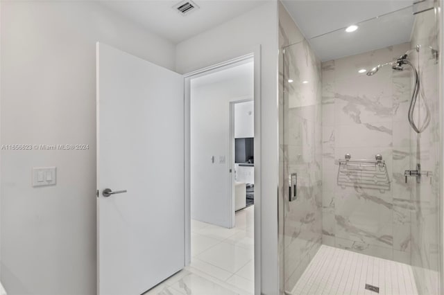 bathroom featuring an enclosed shower