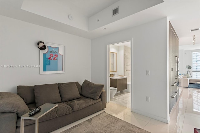 living room with light tile patterned floors